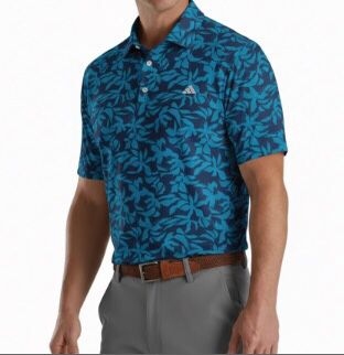 Teal floral custom golf polo — tournament apparel sample