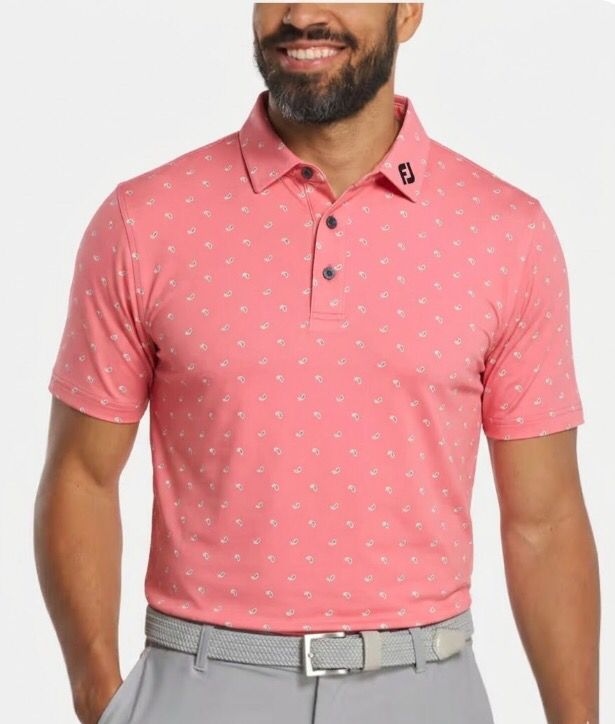 Custom pink golf polo on model — golf club uniform sample