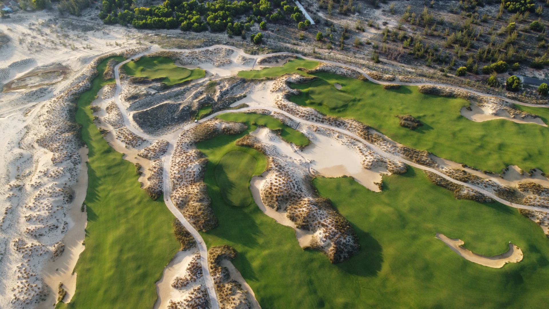 Aerial view of Hoiana Golf Club — white sand dunes and fairways, Vietnam
